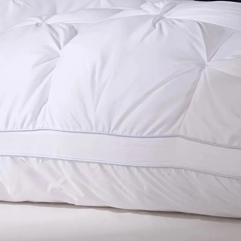 Hotel Grade Pillow showcased in luxurious white fabric with plush design for ultimate comfort and support.